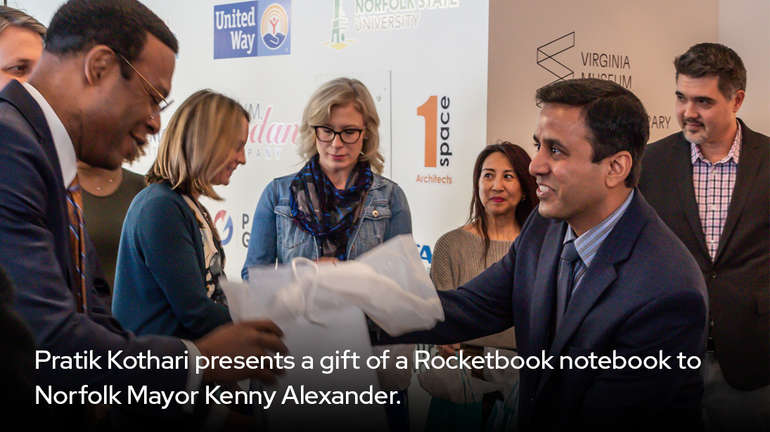 Pratik Kothari presents a gift of a Rocketbook notebook to Norfolk Mayor Kenny Alexander-alt