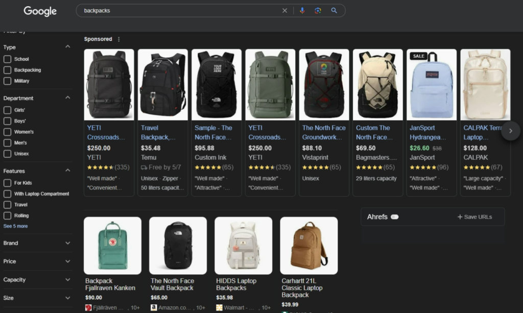 A Google search engine results page for the phrase "backpacks." The page shows ads for eight different backpacks at the top, while below it, the organic results for backpacks are showed in rows of four products.