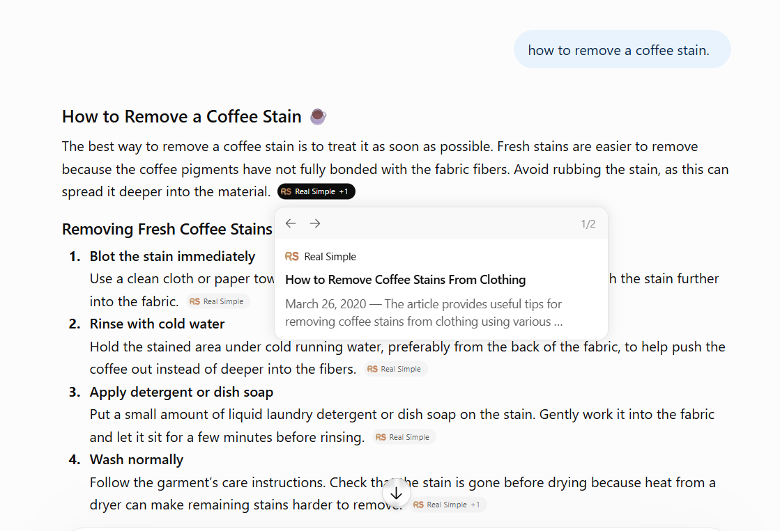 AI chat response for 'how to remove a coffee stain' with cited Real Simple sources and a step-by-step list
